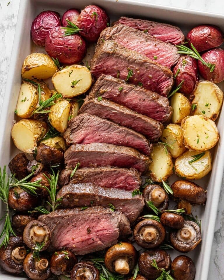 Christmas Beef Tenderloin with Roasted Potatoes, Mushrooms, and Blue Cheese Cream Sauce Recipe