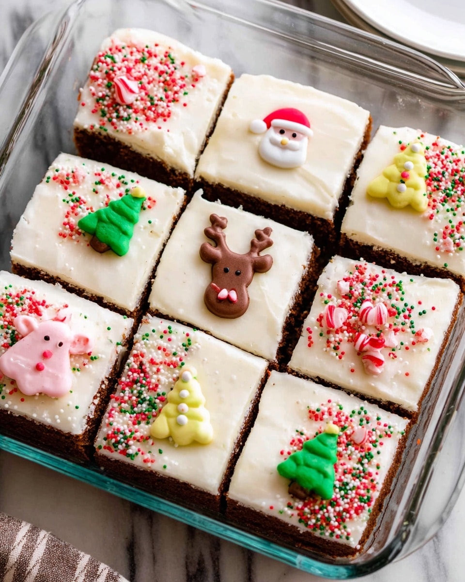 The image shows nine square pieces of gingerbread cake in a clear glass baking dish, each topped with a thick layer of smooth, creamy white frosting. Each square has a small festive decoration on top, including Santa faces, reindeer heads, Christmas trees, and gingerbread men, made from colorful frosting with red, green, yellow, pink, white, and brown details. The frosting is sprinkled with tiny red, green, and white round sprinkles, and some red candy cane-shaped sprinkles. The cake layer underneath is a dark brown color with a dense, moist texture. The baking dish sits on a white marbled surface with an empty white plate visible in the background. photo taken with an iphone --ar 4:5 --v 7