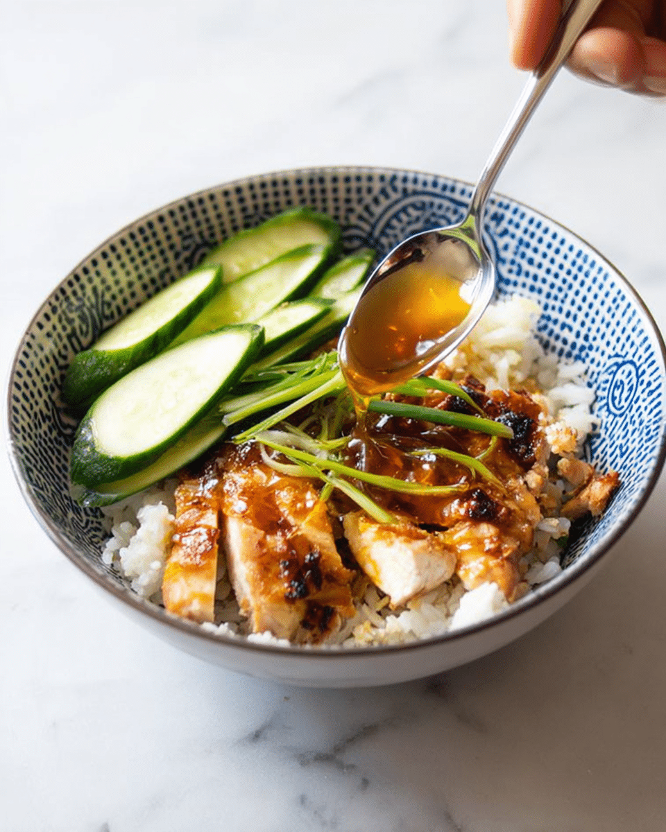 The image shows several large pieces of cooked chicken breasts with a light golden brown color and a slightly charred texture on a white marbled surface. Each chicken piece is topped with a glossy, orange glaze sauce that has visible seeds and small dark bits, creating a sticky and textured look. Scattered among the chicken pieces are long, grilled green onions with dark, charred spots and a soft texture, adding contrast with their bright and dark green hues. The whole scene looks juicy and savory, with hints of caramelization and spice visible in the sauce and grill marks. photo taken with an iphone --ar 4:5 --v 7