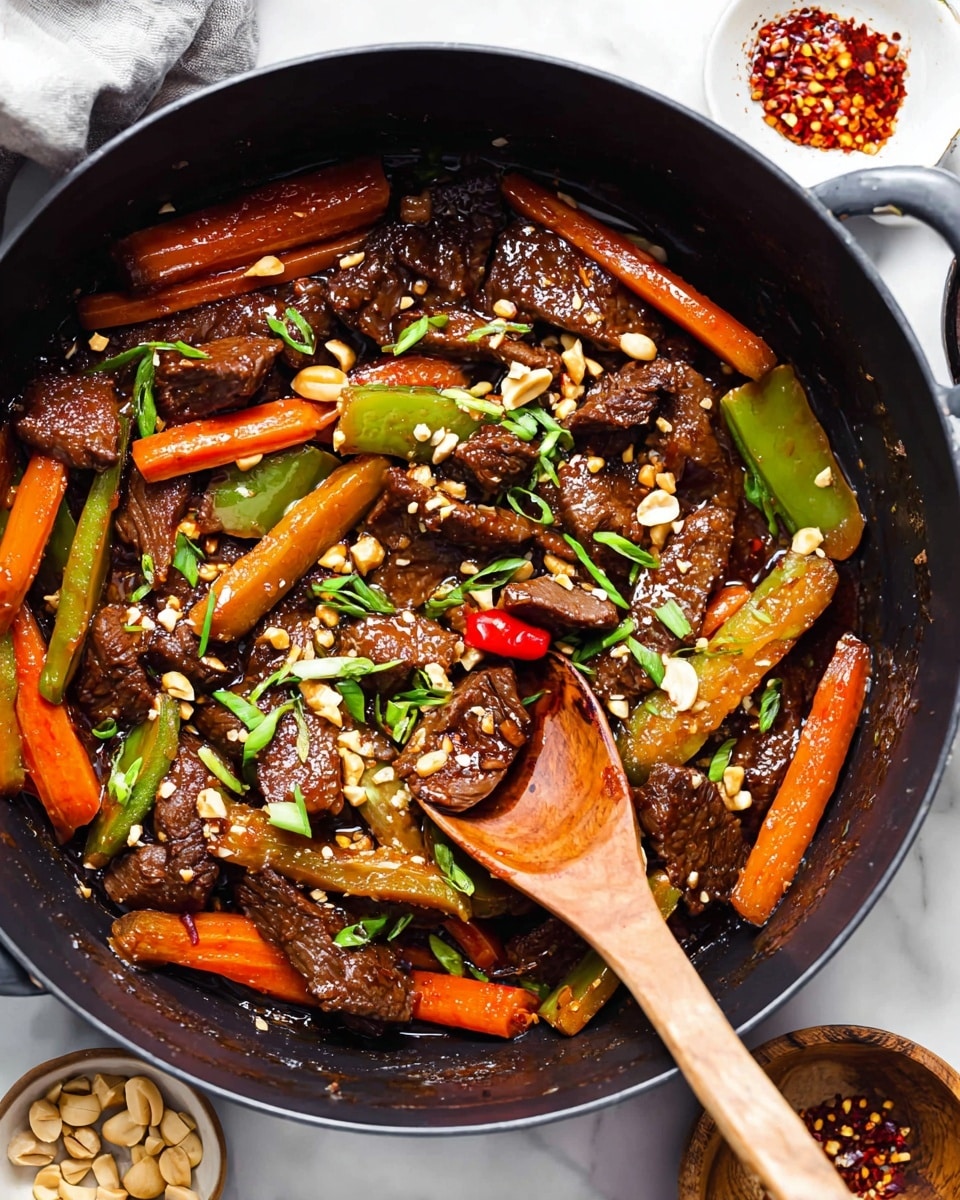 A black pot holds a stir-fry dish with three layers: the first layer has dark brown, glossy pieces of cooked beef scattered evenly; the second layer shows thick carrot sticks and green pepper slices, bright and slightly soft; the third layer is a shiny, rich brown sauce coating all ingredients with chopped green onions and crushed peanuts sprinkled on top. A wooden spoon rests inside the pot, partially covering some beef and vegetables, with a small red chili pepper also visible among the pieces. The pot sits on a white marbled surface with small bowls of chili flakes and peanuts nearby. Photo taken with an iphone --ar 4:5 --v 7