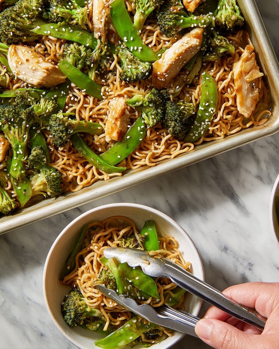 The image shows a close-up of a serving of stir-fried noodles with broccoli, snap peas, and pieces of cooked chicken, garnished with sesame seeds. There are three main layers: the bottom layer has light brown, curly cooked noodles that look slightly glossy; scattered on top are bright green broccoli florets and snap peas with a slight char; the top layer has light golden slices of chicken, some with grill marks, and sprinklings of white sesame seeds. A pair of silver tongs held by a woman's hand is lifting some noodles from a white bowl, and a large tray filled with the same dish is partially visible next to the bowl. The background is a white marbled texture. Photo taken with an iphone --ar 4:5 --v 7