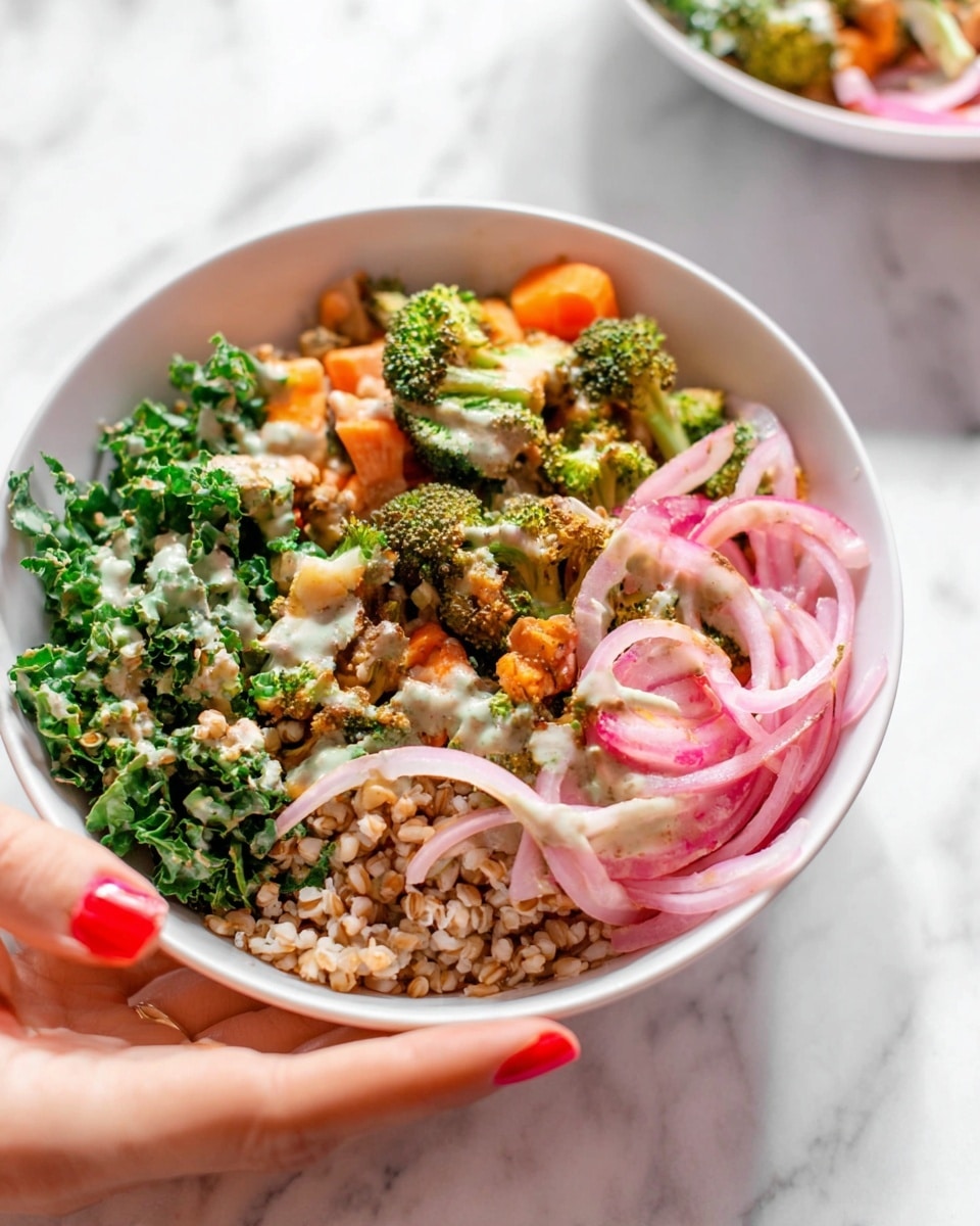 A white bowl filled with a colorful layered salad starts with a base of green leafy kale at the bottom left, topped with a layer of light brown grains mixed with some greens in the center. To the top right, pieces of cooked orange carrots and green broccoli florets sit covered with a light creamy dressing. On the right edge, thinly sliced translucent pink onions lay over the grains and veggies. The bowl is held gently by the fingertips of a woman’s hand with red nail polish, and the scene is set against a white marbled surface. photo taken with an iphone --ar 4:5 --v 7