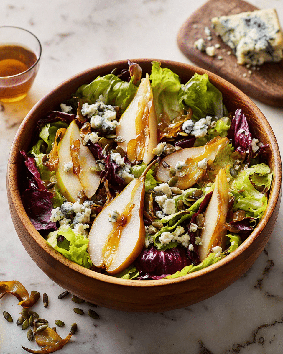 A wooden bowl holds a fresh salad with three main layers: the bottom layer is bright green leafy lettuce mixed with dark purple radicchio leaves, the middle layer features golden brown caramelized pear slices evenly spread on top, and the upper layer is sprinkled with small chunks of creamy blue cheese and toasted pumpkin seeds for texture. The salad sits on a white marbled surface with a few pieces of blue cheese and seeds scattered around, creating a simple and natural look. photo taken with an iphone --ar 4:5 --v 7