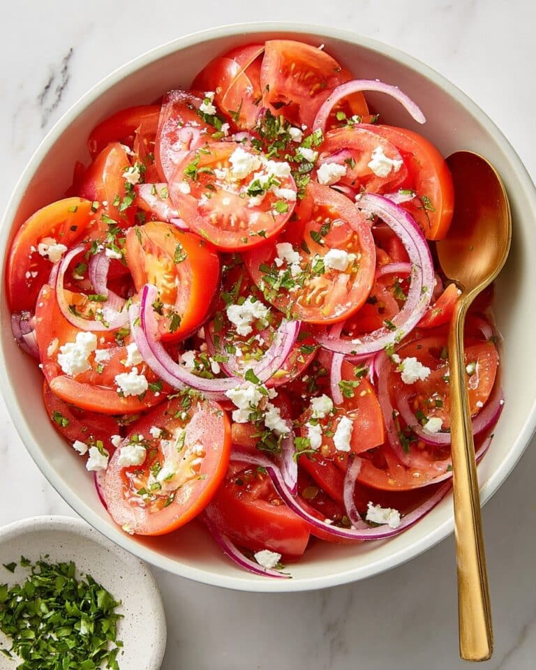 Tomato Salad with Feta, Fresh Herbs, and Honey Vinaigrette Recipe